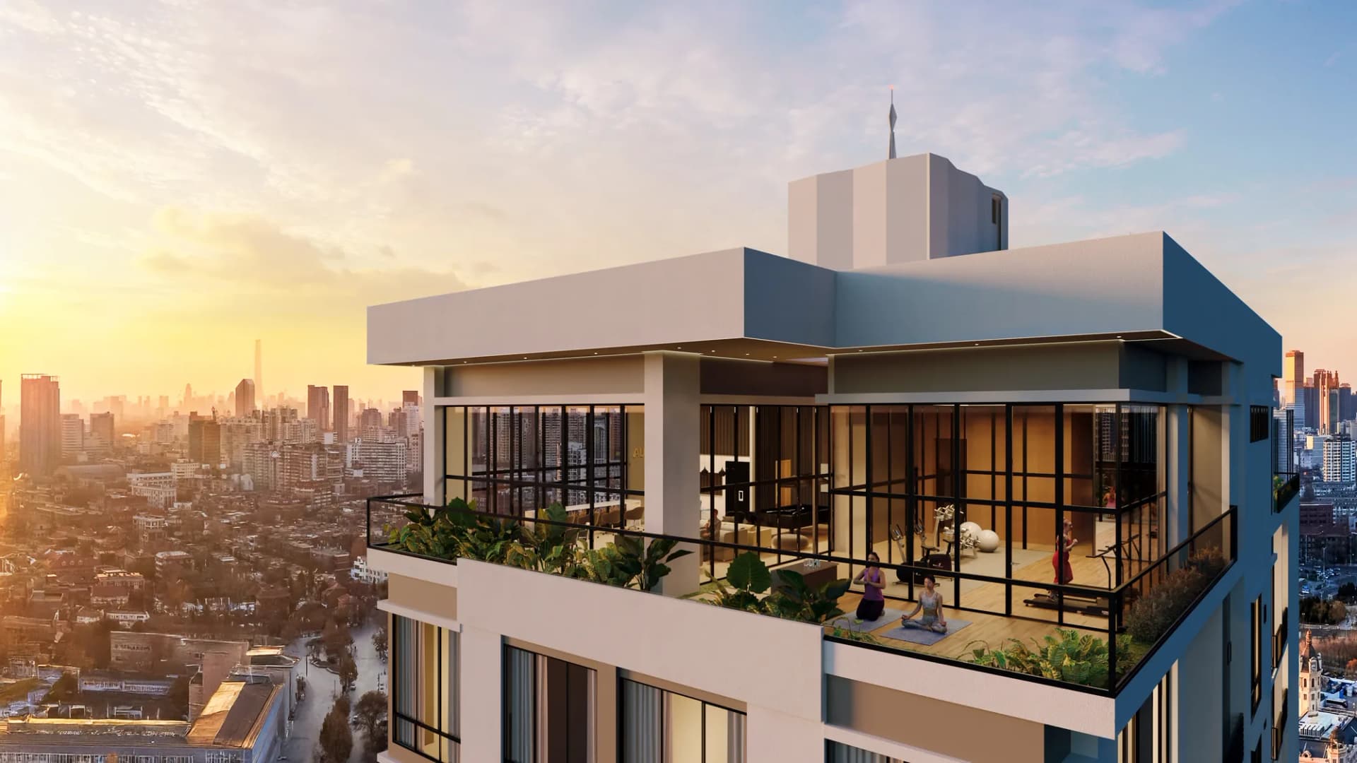 Rooftop de AURA con área de yoga y gimnasio al atardecer