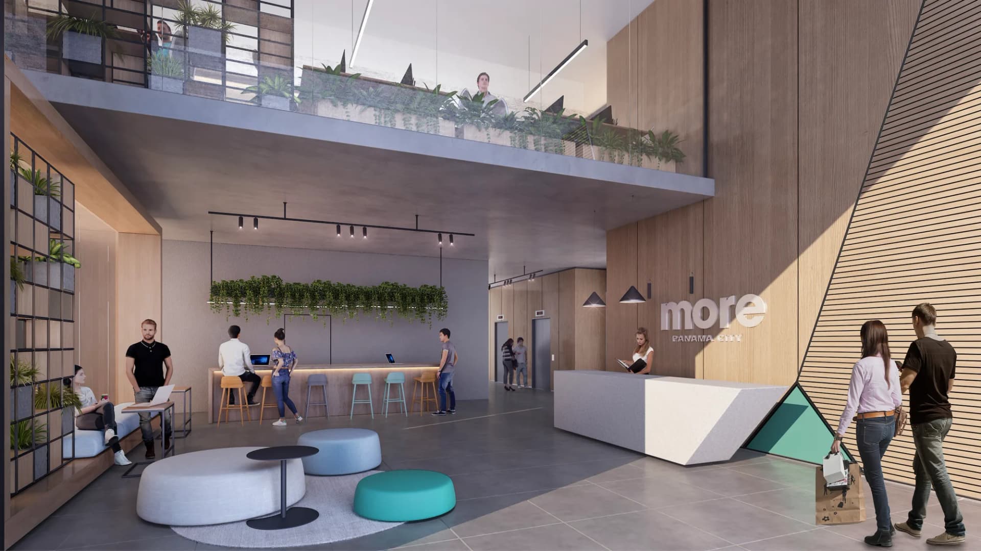 Lobby de doble altura de MORE con área de coworking
